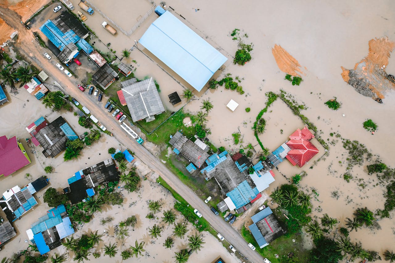 about-01 Aerial shot of a flooded town in Kijal, Terengganu, Malaysia, highlighting water damage.
